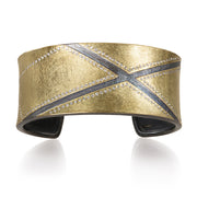 Todd Reed cuff bracelet with white brilliant cut diamonds (~1.02ct) 18k yellow gold, and sterling silver with patina.
